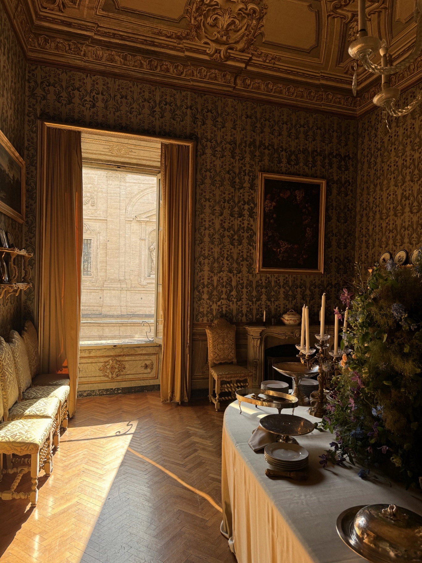 Late afternoon light across the gold salon